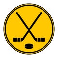 Two crossed hockey sticks and puck icon. Royalty Free Stock Photo