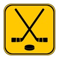 Two crossed hockey sticks and puck icon. Royalty Free Stock Photo