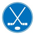 Two crossed hockey sticks and puck icon. Royalty Free Stock Photo