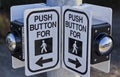 Two crosswalk buttons.