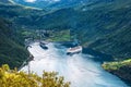 Two cruise liners on anchor in Geiranger fjord