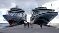 Two cruise ships on a background of cloudy sky. The Caribbean Royalty Free Stock Photo