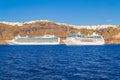 Cruise ships at Santorini Caldera villages perched at cliff top Greece Royalty Free Stock Photo