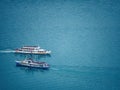 Two cruise tourist ships on Worthersee (WÃÂ¶erthersee) in Austria, Carinthia in the summer, aerial view Royalty Free Stock Photo