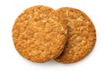 Two crunchy oat and wholemeal biscuits isolated on white. Top view Royalty Free Stock Photo