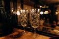 two crystal glasses festive champagne blur light Royalty Free Stock Photo