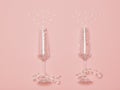 Two crystal glasses with sequins imitating champagne splashes on a pink background.