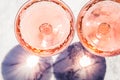 Two crystal stemmed glasses with rose wine
