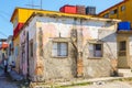 Two Men Near a Decaying Building in Cuba Royalty Free Stock Photo