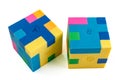 Two cube puzzle of multi-colored rubber shapes. Concept of decision making process, creative, logical thinking. Logical tasks Royalty Free Stock Photo