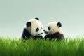 Two Cuddly Panda Babies Playing In The Green Grass