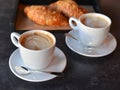 Two cup of coffee with freshly baked croissants Royalty Free Stock Photo