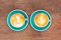 Two cup of hot coffee with latte art. Favorite caffeine beverage. Refreshment drink in morning Royalty Free Stock Photo