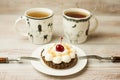 Two Cup of tea and cake on the table Royalty Free Stock Photo