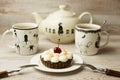 Two Cup of tea and cake on the table Royalty Free Stock Photo