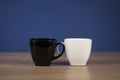 Two cups black and white Royalty Free Stock Photo