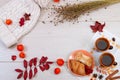 Two cups of brown clay with tea are on a white linen napkin. Butter cookies and cake with cottage cheese are on a round plate. Vib Royalty Free Stock Photo