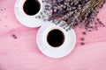 Two cups of coffee with bouquet of flowers lavender Royalty Free Stock Photo