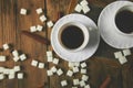 Two cups of coffee espresso near sugar cube Royalty Free Stock Photo