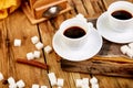 Two cups of coffee espresso near sugar cube Royalty Free Stock Photo