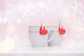 Two cups of coffee, hearts bokeh, Valentine`s concept