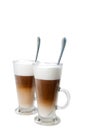 Two cups coffee latte isolated on white background Royalty Free Stock Photo