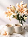 Two cups of coffee with milk and bouquet of lilies in a vase.