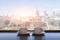 Two cups of coffee with panoramic view of a city in background Royalty Free Stock Photo