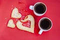 Two cups of coffee on red background, love, valentine day, strong coffee - strong love family, dating romance Royalty Free Stock Photo