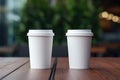 Ai generated two cups of freshly brewed black coffee in stylish plain eco-cups.