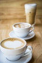 Two cups of hot cappuccino coffees Royalty Free Stock Photo