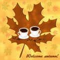 Two cups of hot coffee on the autumn background