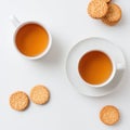 Two cups of hot tea with biscuits on white tray Royalty Free Stock Photo