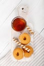 Two cups of hot tea with delicious cookies on  wooden table Royalty Free Stock Photo