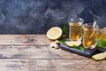 Two cups of natural herbal tea ginger lemon mint and honey on a wooden background. Copy space Royalty Free Stock Photo