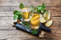 Two cups of natural herbal tea ginger lemon mint and honey on a wooden background. Copy space Royalty Free Stock Photo
