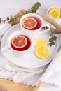 Two cups of red fruit and herbal tea with lemon slice Royalty Free Stock Photo