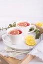 Two cups of red fruit and herbal tea with lemon slice, Royalty Free Stock Photo