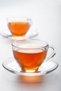 Two cups of tea over white background Royalty Free Stock Photo