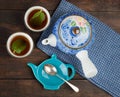 Two cups, teapot and spoon. Top view. Royalty Free Stock Photo