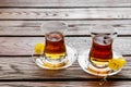 Two cups of traditional Turkish tea on a table in a street cafe in Istanbul, Turkey. Royalty Free Stock Photo