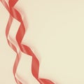 Two curled ribbons with shadows in left part of blank square shot. Top view. Copy space for text or design, Coral