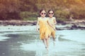 Two asian child girls play and run on beach Royalty Free Stock Photo