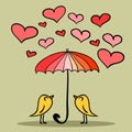 Two cute birds under the umbrella