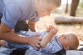 Two cute boys - brothers, spend time outdoors, in the city, in the woods Royalty Free Stock Photo