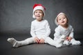 Two cute boys in Santa hats Royalty Free Stock Photo