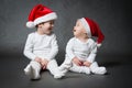 Two cute boys in Santa hats Royalty Free Stock Photo