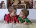 Two cute boys , smiling and talking , portrait.