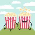 Two cute cartoon popcorn characters in love. Two popcorn buckets are sitting on the grass with heart shaped eyes