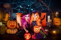 Two cute funny sisters celebrate the holiday. Jolly children in carnival costumes ready for Halloween. Royalty Free Stock Photo